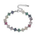 Bracelet fin Ambre & Lune en laiton, fleurs serties de strass CZ colorés, finition argentée, fermoir ajustable